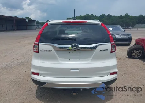 2016 Honda Cr-V Touring z USA, uszkodzony, nr VIN 5J6RM4H95GL118070
